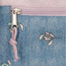 Détail du tissu résistant et des coutures renforcées du sac à dos Disney Stitch