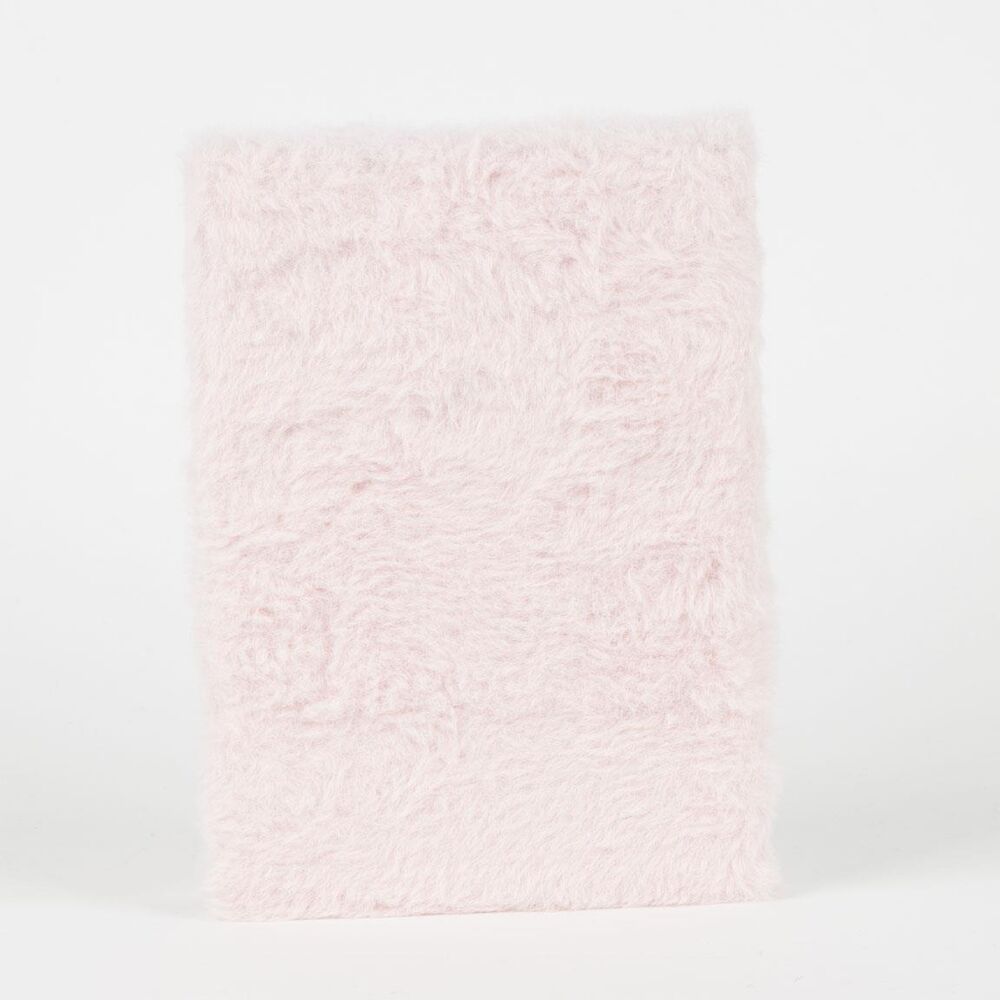 Vue latérale montrant l'épaisseur de 3 cm du cahier peluche Hello Kitty CERDÁ