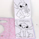 Set de carnets Disney Stitch posé sur une table avec accessoires de bureau colorés