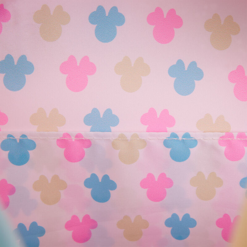 Photo d'ensemble du sac à dos Loungefly Minnie Mouse posé sur une surface neutre, illustrant son style