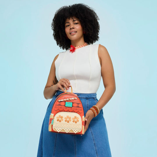 Charm en émail sur la fermeture éclair du sac à dos Disney Vaiana Loungefly, détail unique