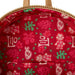 Gros plan sur les motifs imprimés et le cuir tissé du sac à dos Loungefly Lilo & Stitch