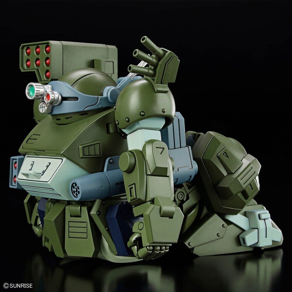 Profil latéral du Scopedog Turbo Custom montrant ses articulations et équipements tactiques