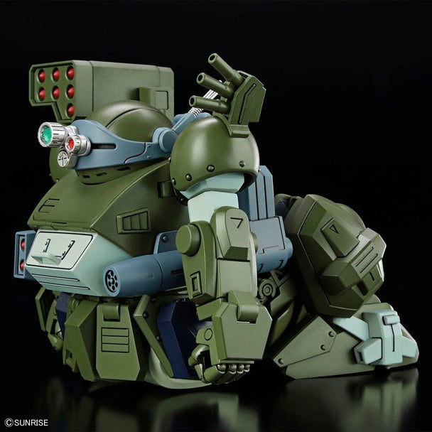 Profil latéral du Scopedog Turbo Custom montrant ses articulations et équipements tactiques