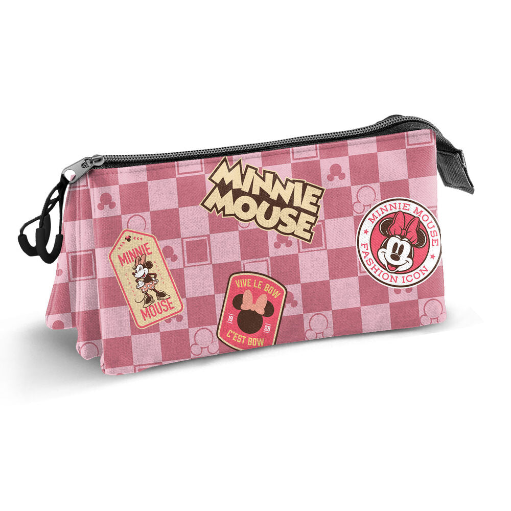 Trousse Minnie posée sur un bureau avec fournitures scolaires, illustrant son usage pratique