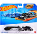 Vue rapprochée du camion transporteur Hot Wheels montrant les détails réalistes et la finition métallique