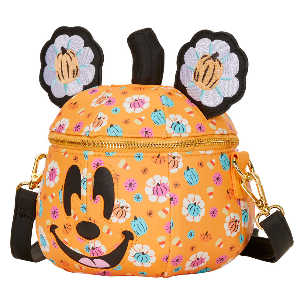 Sac Loungefly Disney Minnie Citrouille posé sur une surface neutre avec éclairage mettant en valeur les couleurs