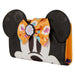 Vue latérale du portefeuille Minnie Citrouille montrant l'épaisseur et la fermeture sécurisée