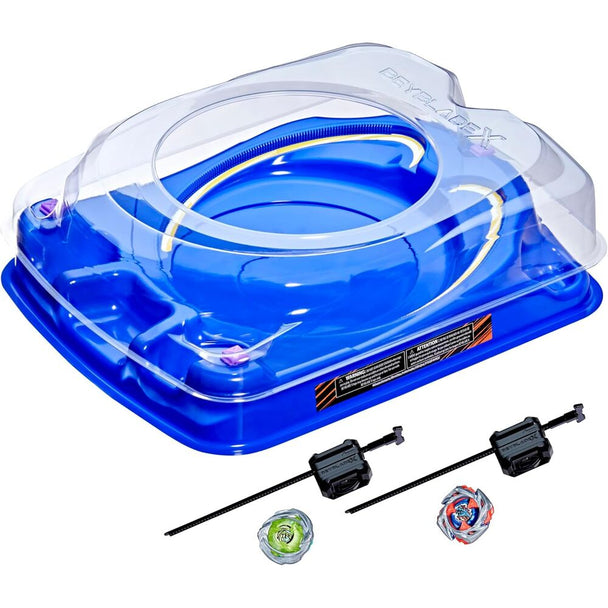 Le set complet Beyblade X Drop Attack avec arène et accessoires de lancement sur fond blanc