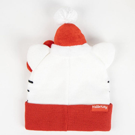 Bonnet de Noël Hello Kitty CERDÁ, gros plan sur le visage souriant de Hello Kitty avec son bonnet de Père Noël rouge.