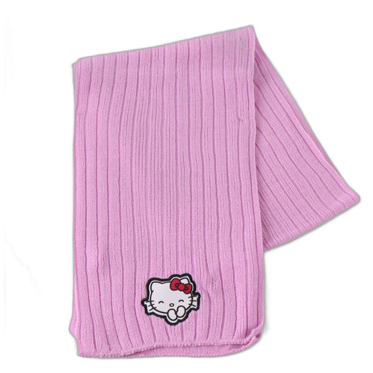 Les gants roses Hello Kitty de l'ensemble hiver CERDÁ, conçus pour garder les mains des enfants au chaud et confortables pendant les journées froides d'hiver.