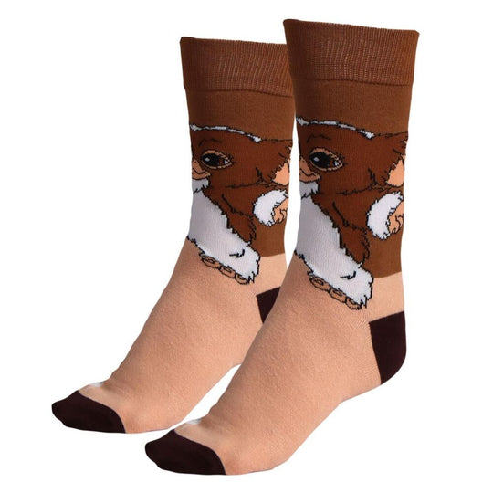 Gros plan sur les chaussettes Gremlins CERDÁ, montrant la qualité du coton et le design unique, parfaites pour un look geek assumé.