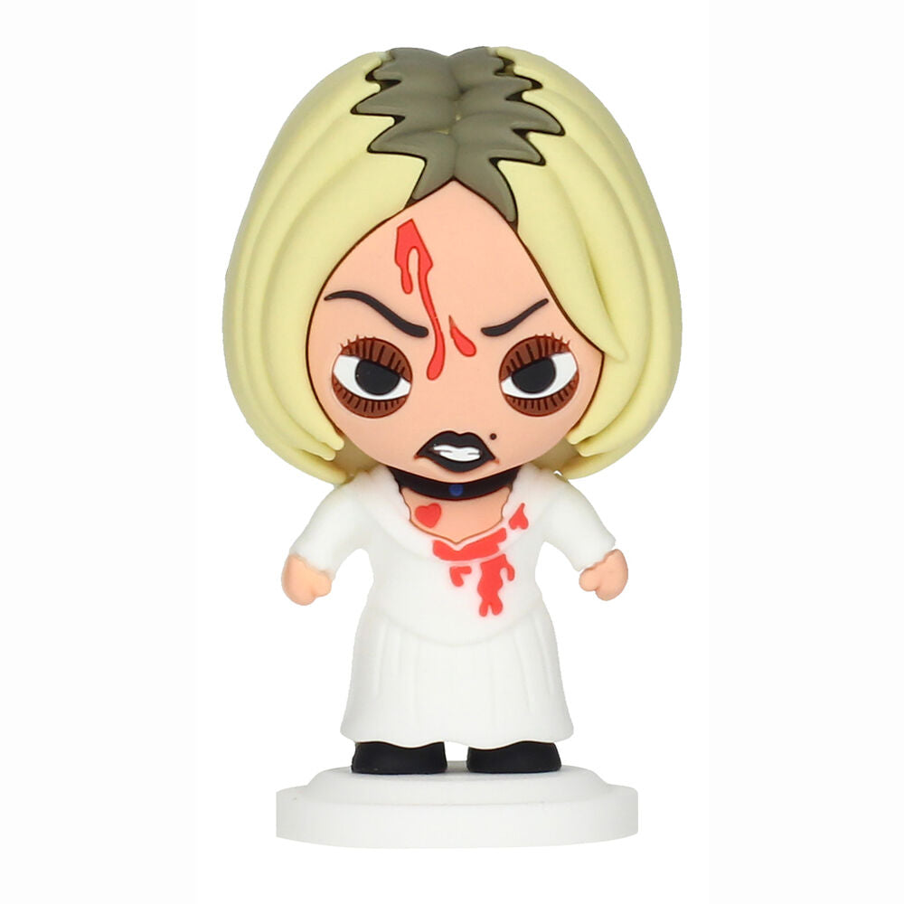 Figurine Chucky Pokis 7cm souriante et menaçante, vue de côté, montrant les finitions.