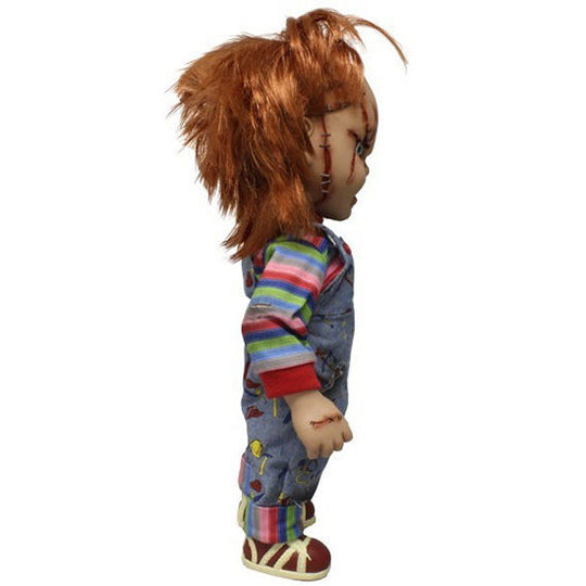 Chucky avec bras levé illustrant la mobilité des articulations