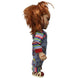 Chucky avec bras levé illustrant la mobilité des articulations
