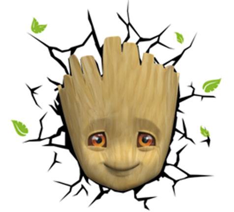 Lampe 3D LED Marvel Baby Groot Face allumée, fixée sur un mur blanc, créant un effet de fissure