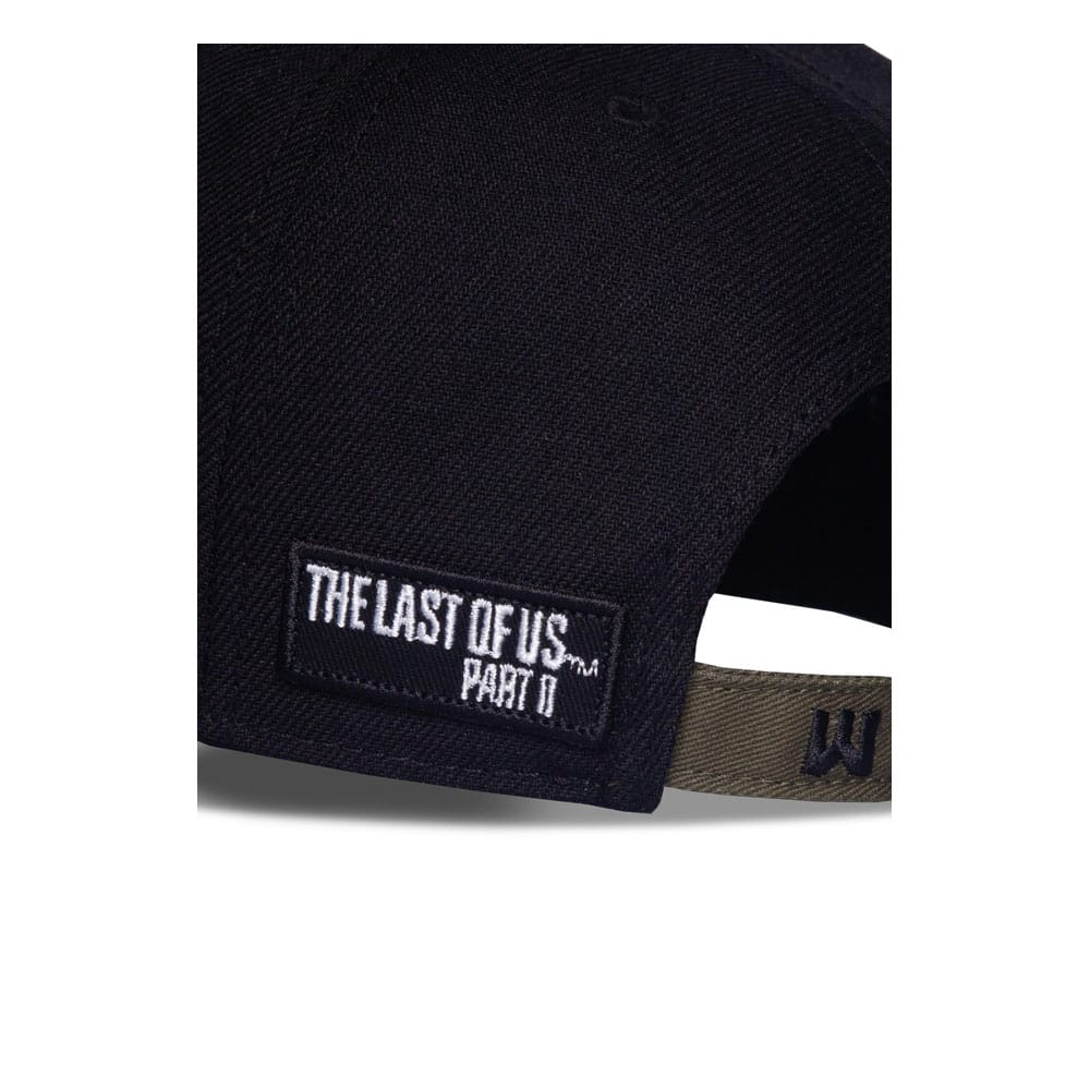 Gros plan sur la texture 100% polyester de la casquette The Last of Us 2
