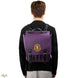 Sac à dos Wednesday Nevermore Academy Purple posé sur une surface