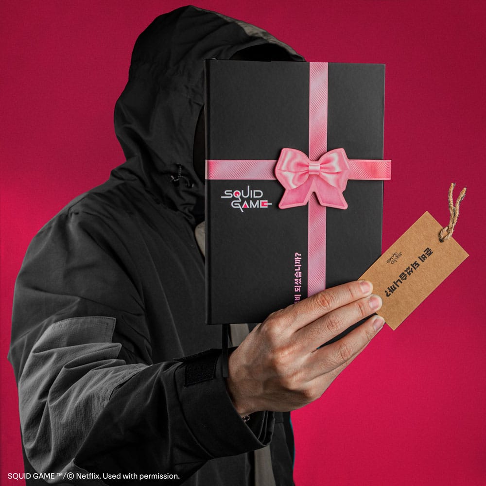 Carnet Coffin Squid Game ouvert, montrant les 160 pages lignées