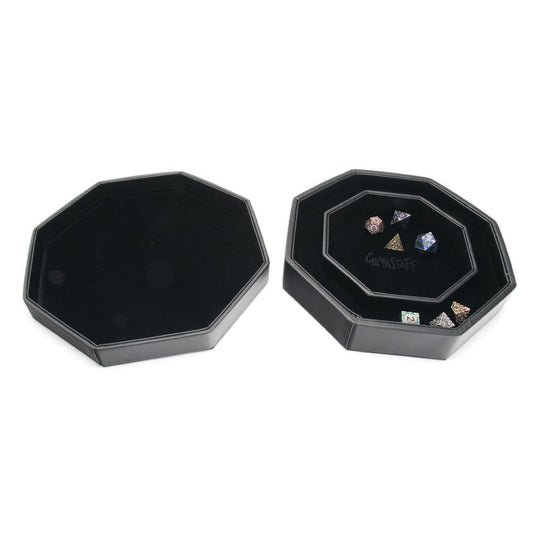 Vue rapprochée de l'illustration holographique du dragon noir sur l'Arena CritStones