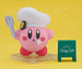 Kirby Nendoroid Kirby Cafe Ver. posant avec un plat de dessert et une fourchette.