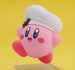 Kirby Nendoroid avec un visage alternatif, tenant un accessoire de nourriture.