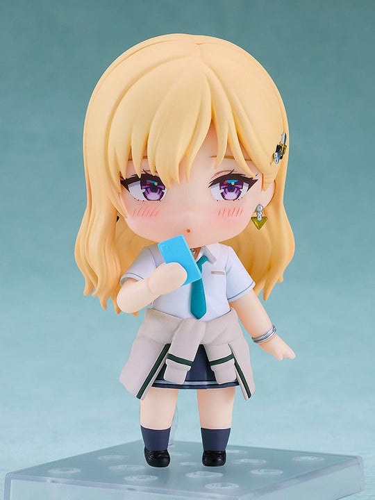 Détail des accessoires de la figurine Saki Ayase, incluant des mains alternatives et des objets spécifiques.