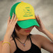 Casquette camionneur Stranger Things jaune et verte, profil gauche
