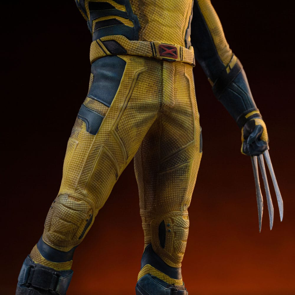 Vue arrière de la statuette Deadpool 3 Wolverine et Headpool, montrant les détails des armes