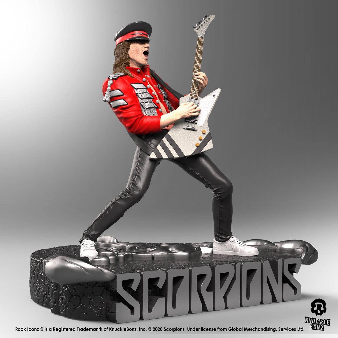 Gros plan sur la guitare et les détails de la statuette Matthias Jabs
