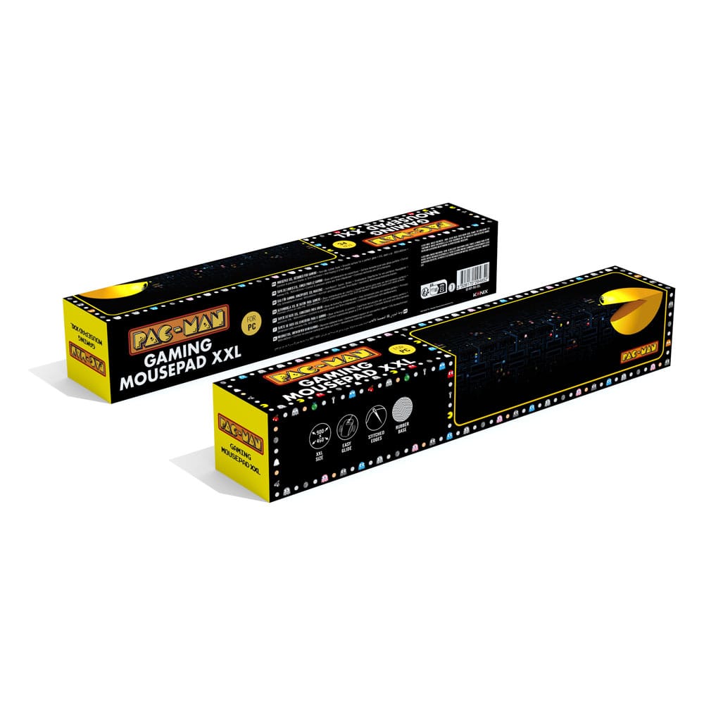 Tapis de souris XXL Pac-Man Konix sur un bureau de gamer avec clavier et souris