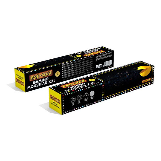 Tapis de souris XXL Pac-Man Konix sur un bureau de gamer avec clavier et souris