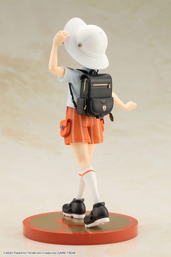 Détail du sac à dos et des accessoires de Juliana