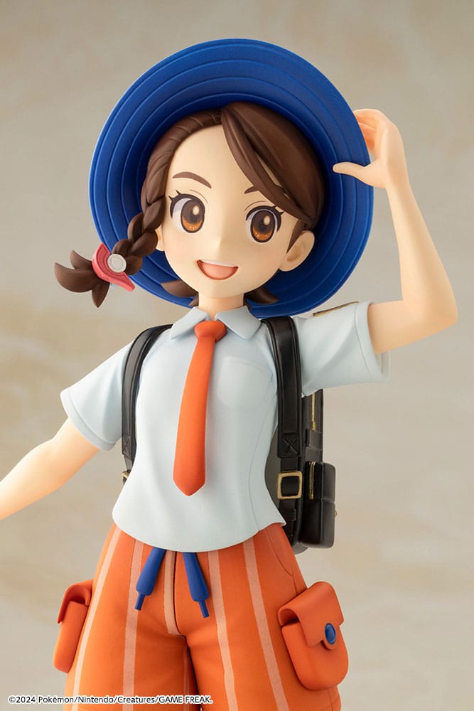 Vue arrière de la statuette Juliana et Sprigatito