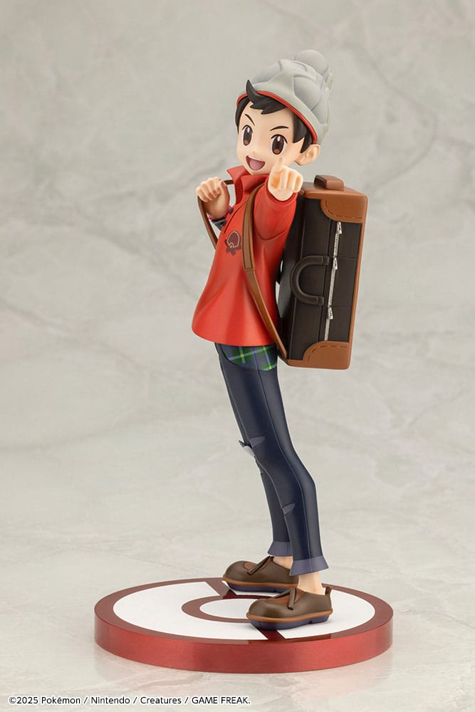 Vue latérale de la statuette Pokémon Victor et Flambino