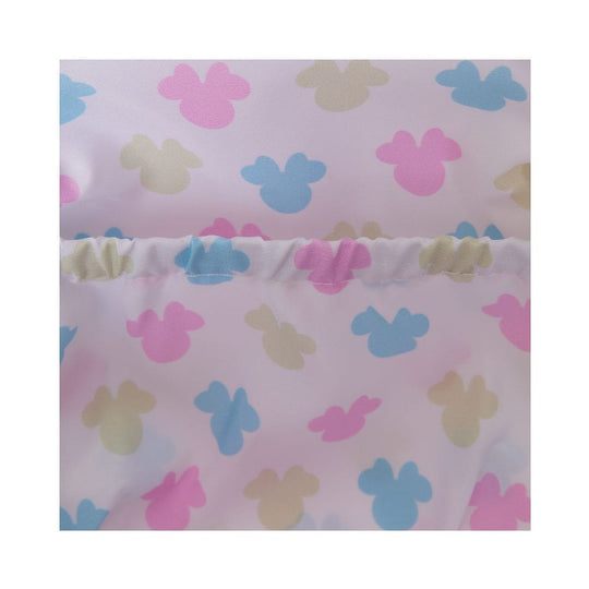 Gros plan sur la matière PU et la texture du sac Minnie Tie Dye