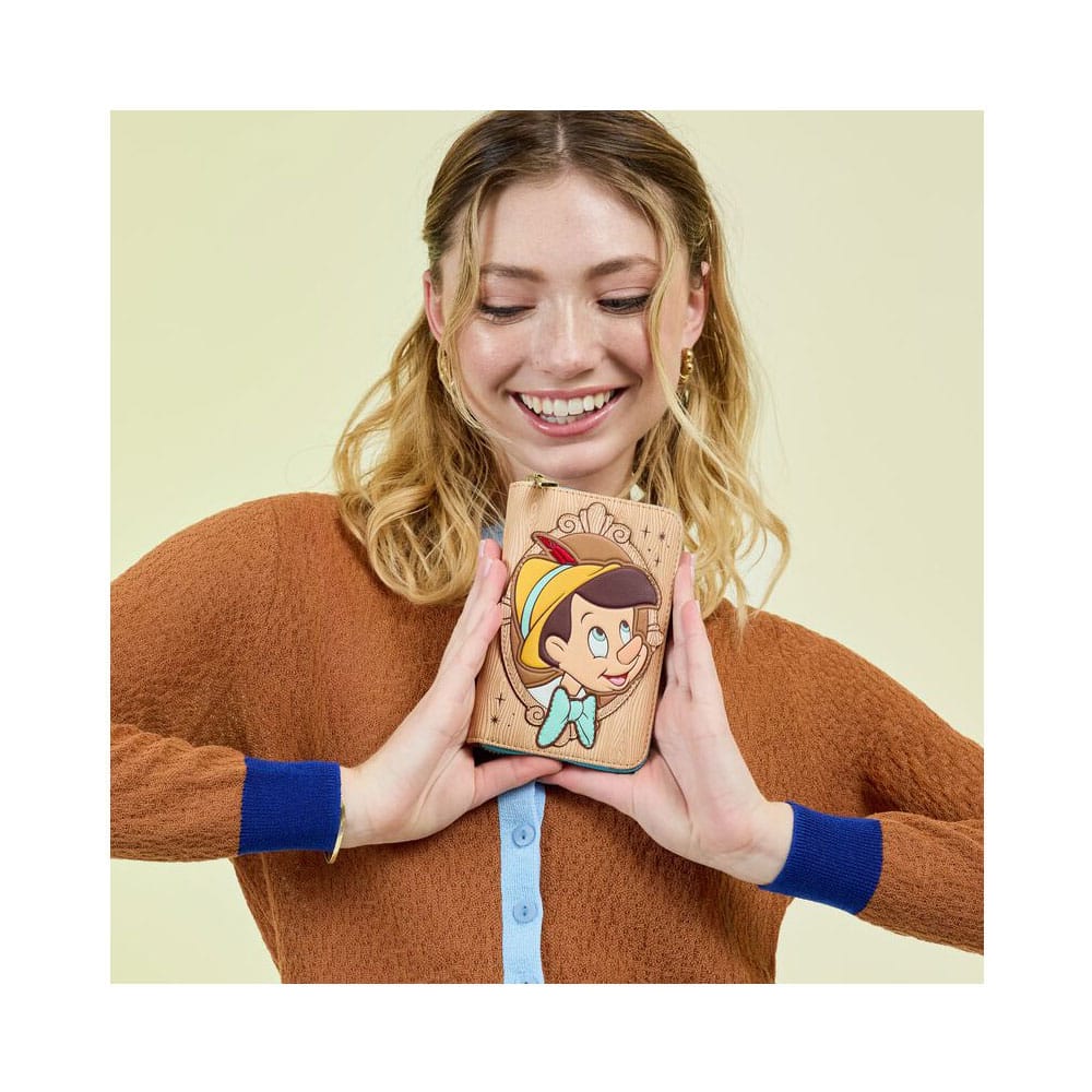 Porte-monnaie Pinocchio Loungefly ouvert, présentant l'organisation interne et le design