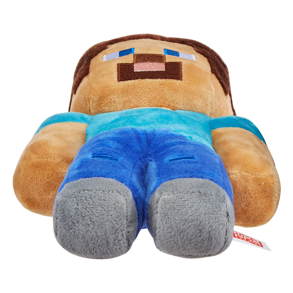 Peluche Minecraft Steve Mattel, posée sur une surface neutre