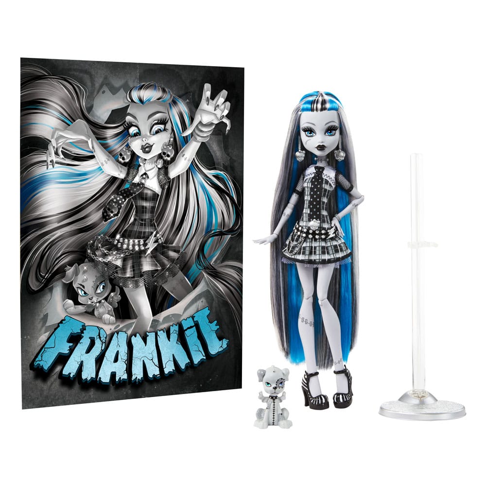Poupée Monster High Frankie Stein avec ses accessoires (sac, brosse, journal) en noir et blanc.