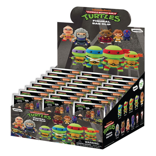 Détail des personnages des Tortues Ninja (Leonardo, Michelangelo, Donatello, Raphael) en porte-clés 3D.