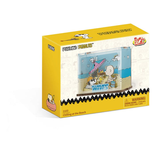 Détail des figurines Snoopy et Woodstock sur la plage du jeu de construction Peanuts