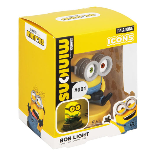 Lampe Minions Bob Icons 11cm, éteinte, posée sur une étagère avec d'autres objets décoratifs