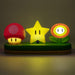 Détail des icônes lumineuses de la lampe Super Mario, avec un focus sur la qualité des symboles
