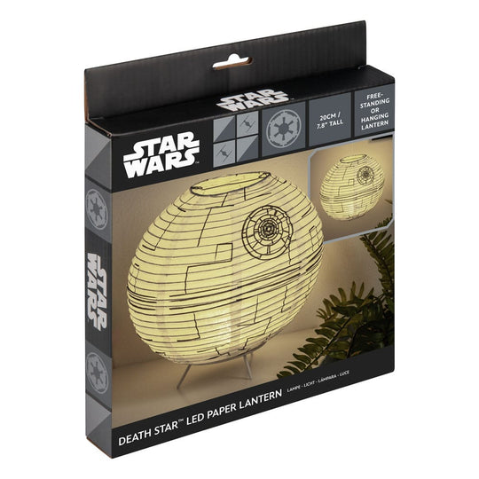 Lampe Star Wars Death Star 21 cm sur un bureau, créant une ambiance lumineuse
