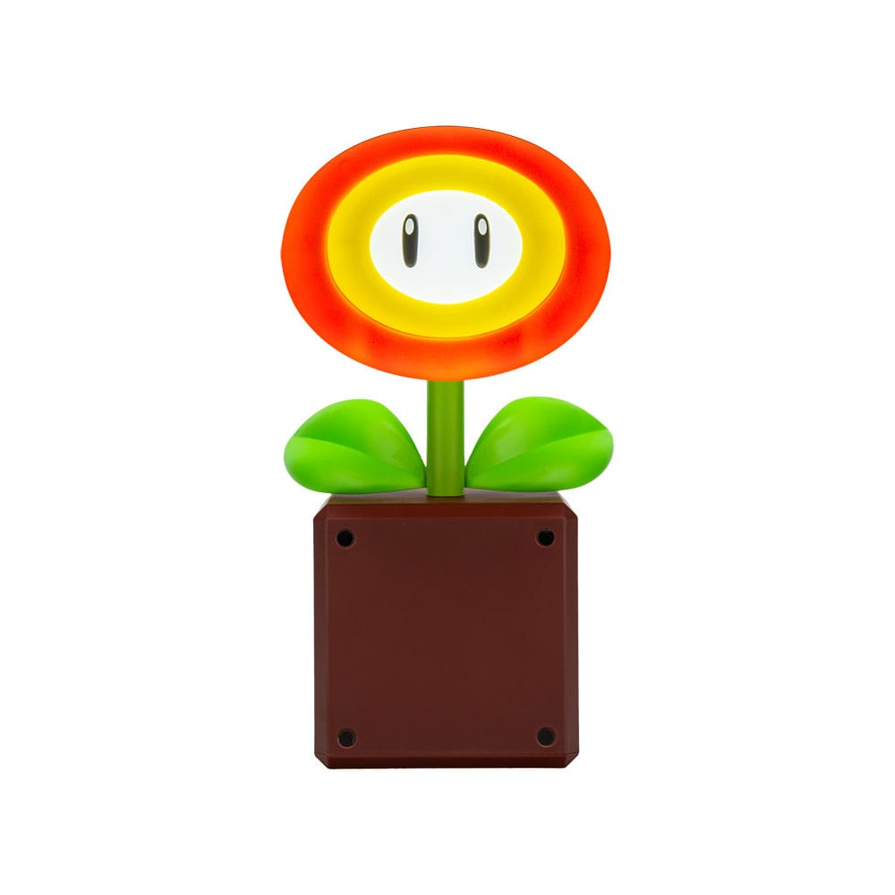 Lampe Super Mario Fire Flower allumée sur une table