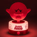Lampe Boo Super Mario à côté d'une console de jeu, créant une ambiance immersive.