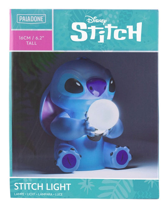 Lampe Stitch sur une étagère avec d'autres objets décoratifs Disney