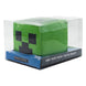 Mug Minecraft 3D Creeper Face avec une boisson chaude, ambiance gaming