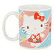 Mug Hello Kitty Robe Rouge Sanrio, vue arrière ou de profil montrant le logo Stor