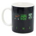 Mug Minecraft Stor avec le motif 'Squared Pattern' révélé par une boisson chaude.